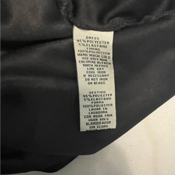 Elegant Black Dress with Embellished Sleeves - Picture 3 of 10